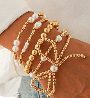 Bow knot pearl beaded multi layered bracelet set For Sale